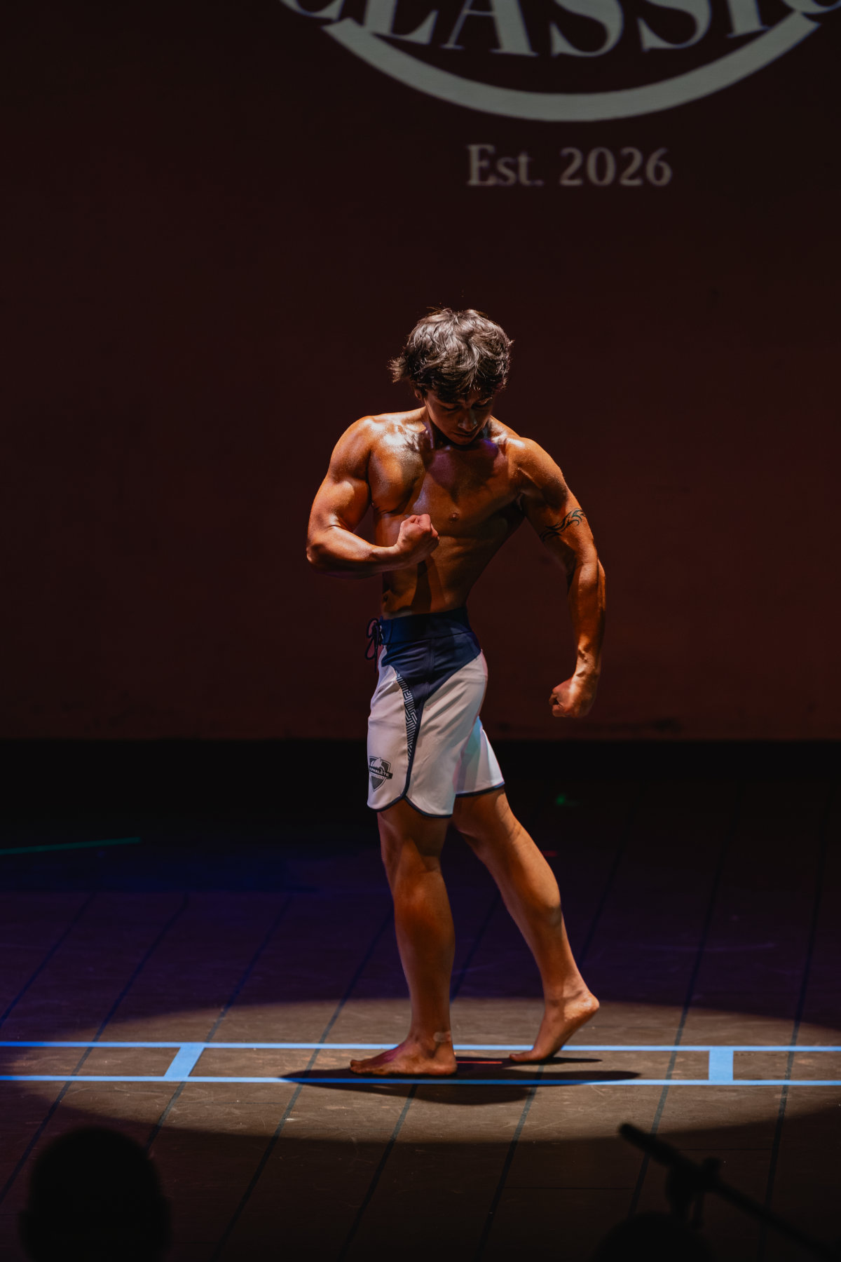 JHKFIT client on stage at the Illini Barbell Classic